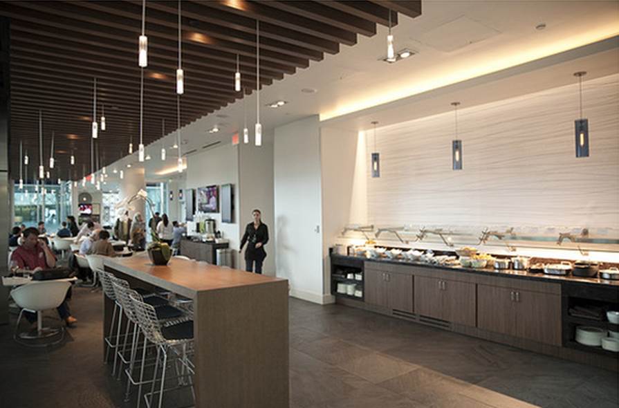 The Centurion Lounge at Dallas-Fort Worth International Airport features a complementary buffet with a menu designed by Dean Fearing, a chef from the Dallas Ritz-Carlton Hotel. Justin Clemons for The Wall Street Journal